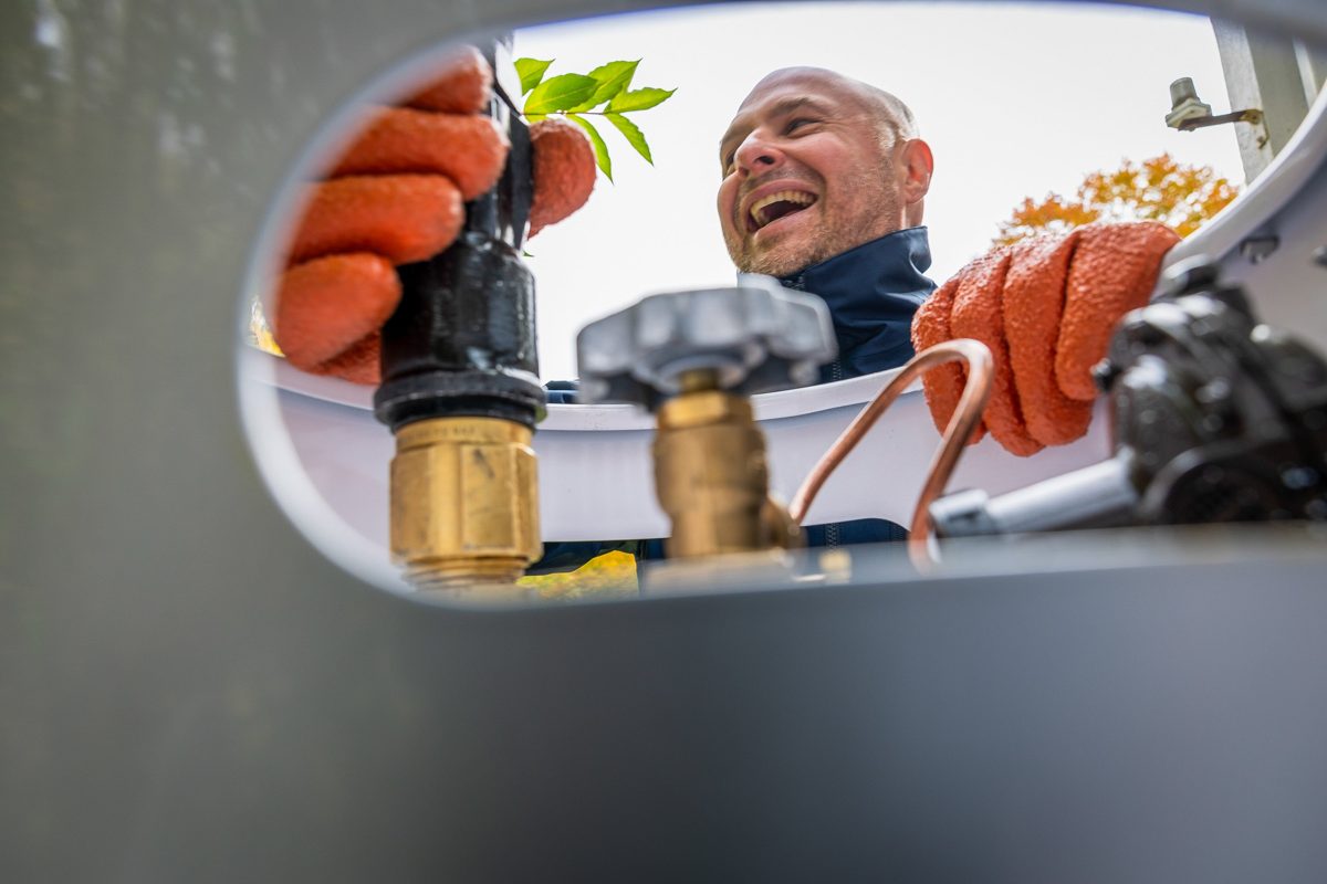 Tankfarm technician servicing a tank valve